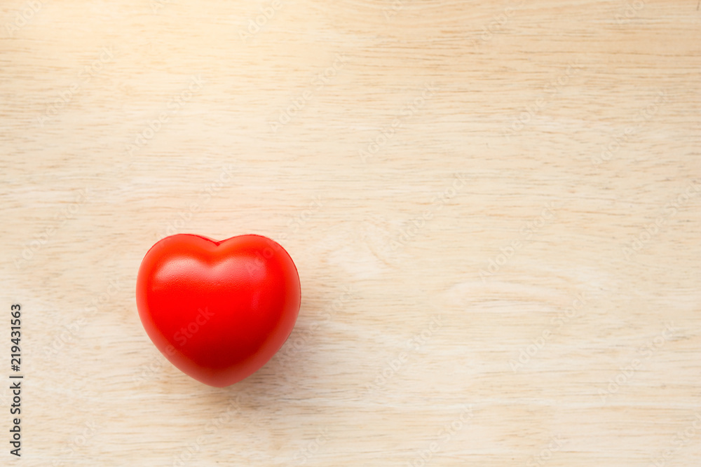 Red heart on wood Red heart on wood