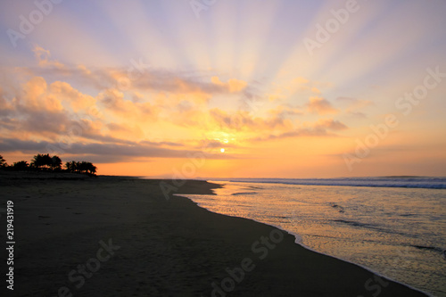Tropical Sunrise over Pacific Ocean Sandy Beach in Mexico © Angelina Cecchetto