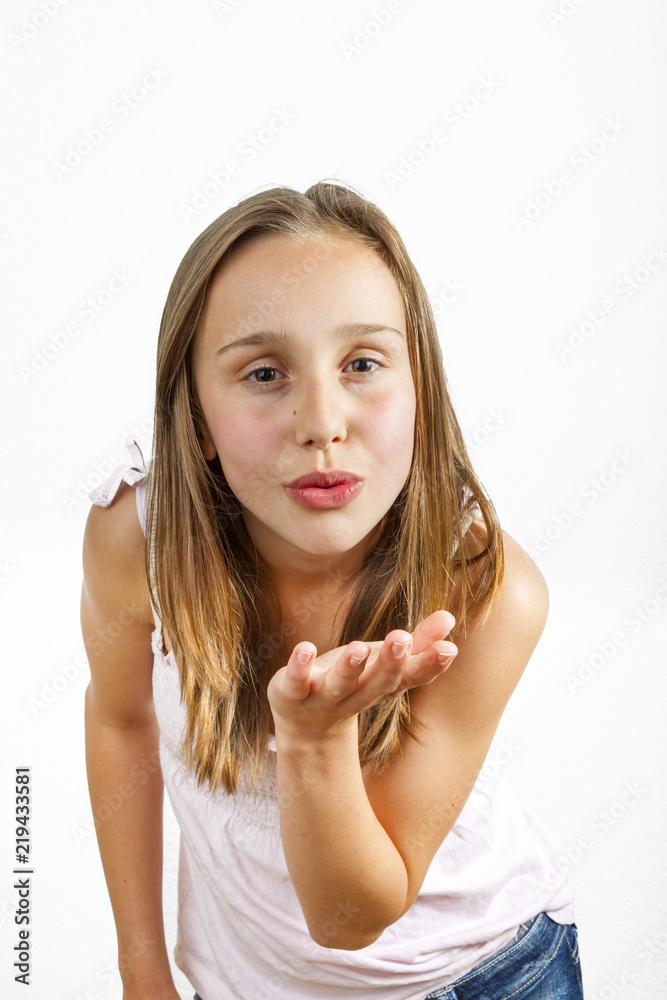 portrait of young teenage girl giving a hand kiss portrait of young teenage girl giving a hand kiss