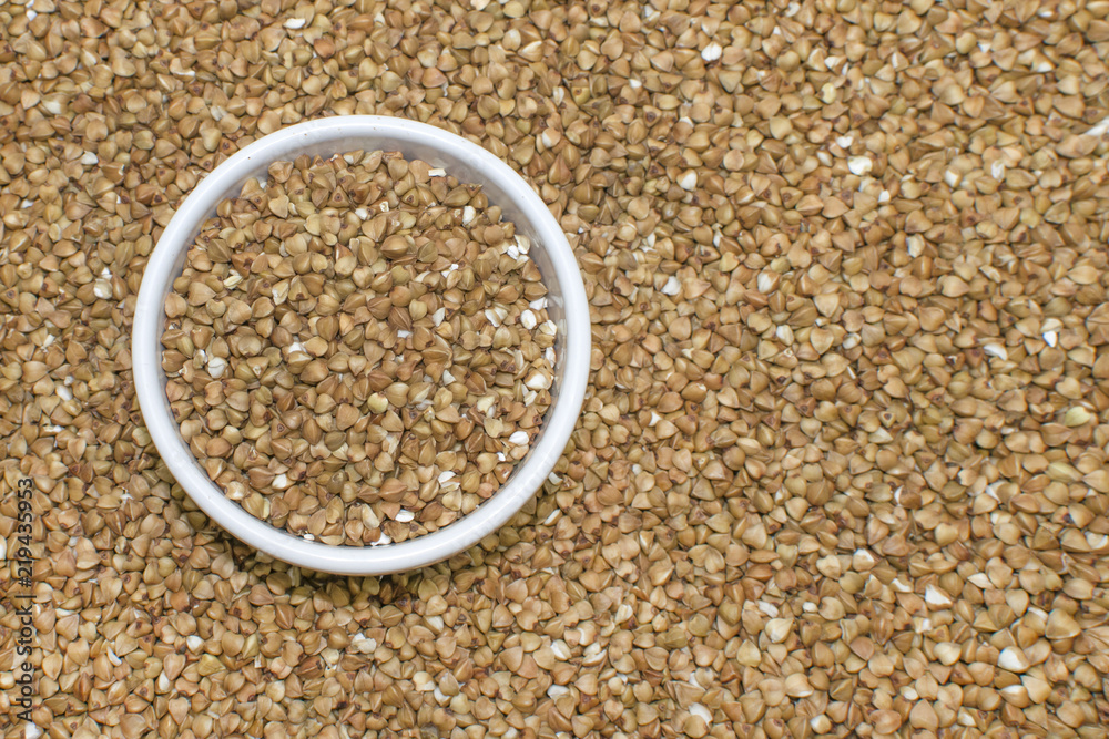 Buckwheat in a plate close up. Background image Buckwheat in a plate close up. Background image