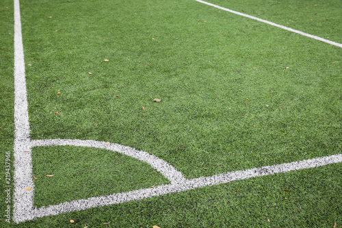 Closeup of Corner kick line of football and soccer field, background texture