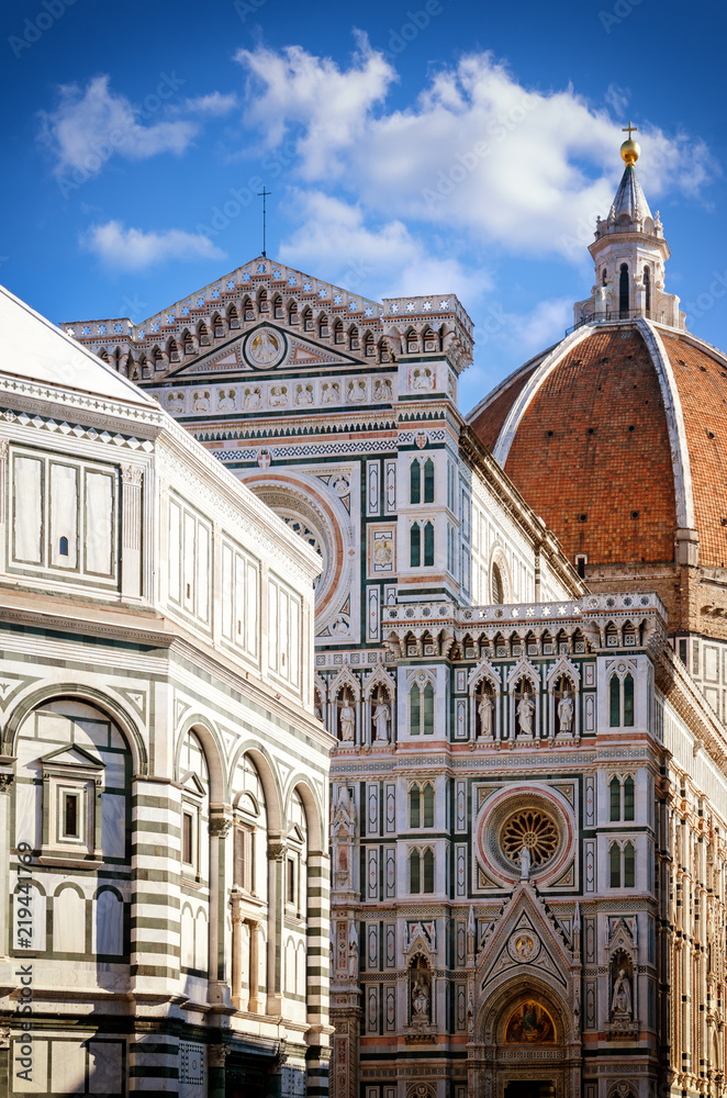 Facade of the famous basilica of Santa Maria del Fiore (Saint Mary of the flower), cathedral of Florence, Italy, with the medieval baptistery and the dome of brunelleschi