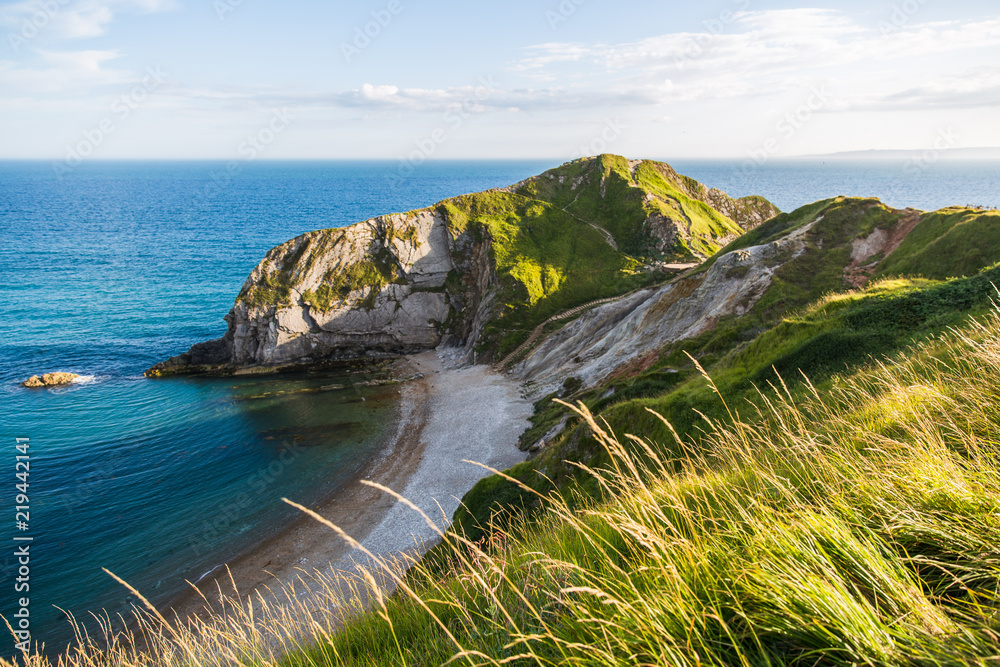 Man of War Beach on West Lulworth Cove on a Sunny Day. Man of War Beach on West Lulworth Cove on a Sunny Day.