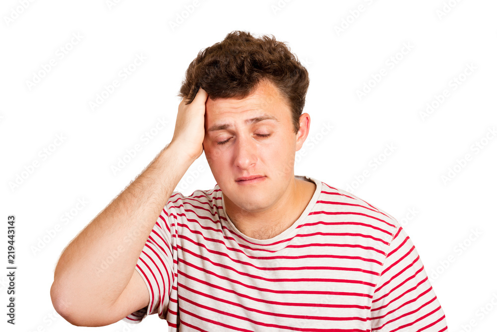 portrait of a crying man holding his head in despair. emotional man isolated on white background portrait of a crying man holding his head in despair. emotional man isolated on white background