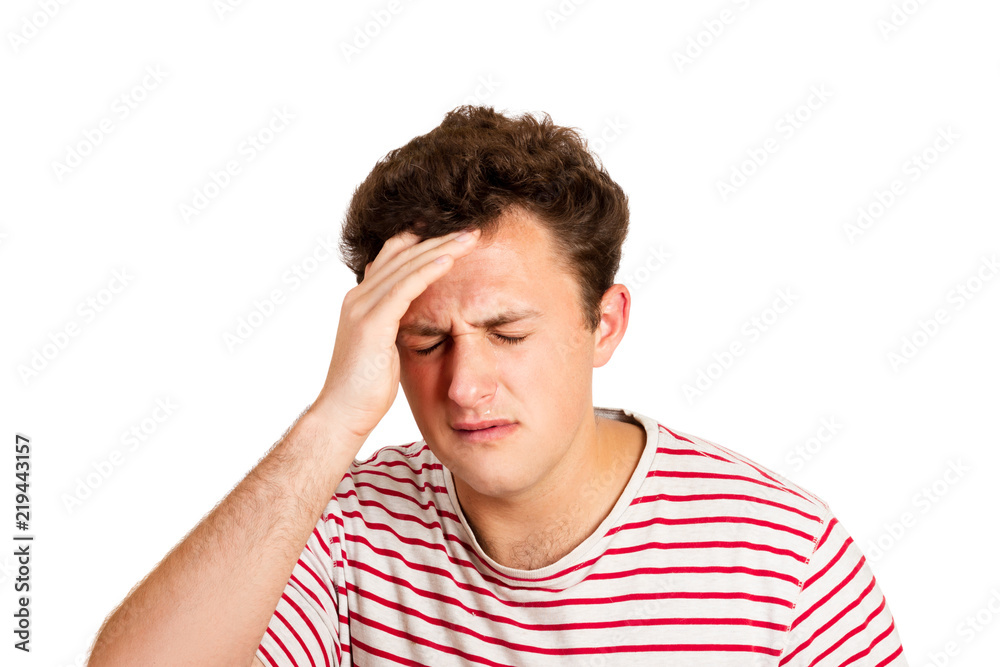 desperate crying man with hand in hair. emotional man isolated on white background desperate crying man with hand in hair. emotional man isolated on white background