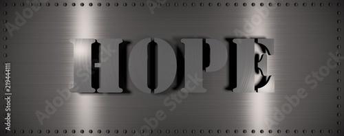 Brushed steel plate with rivets around it and the word 