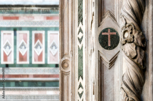 Detail of the famous giotto's campanile, bell tower of the basilica of Santa Maria del Fiore (Saint Mary of the Flower), cathedral of Florence, Italy. photo