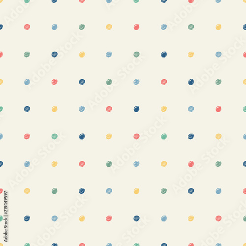 Simple hand drawn multicolored scribble polka dots pattern background texture.