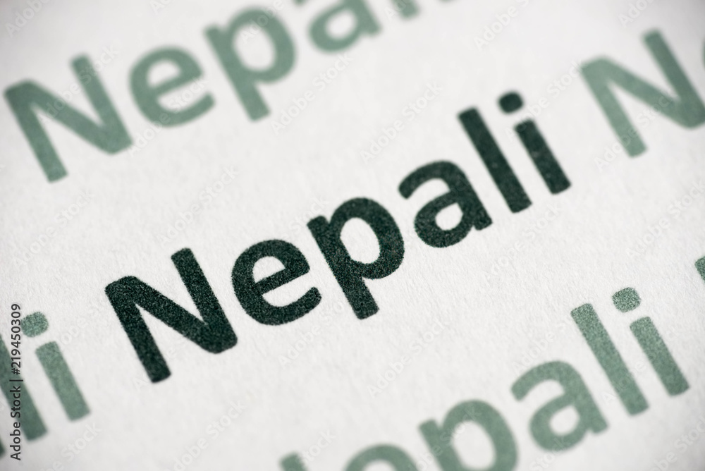 word Nepali language printed on paper macro word Nepali language printed on paper macro