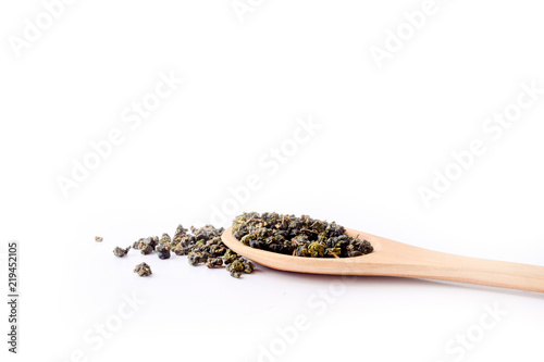Dry tea in wooden spoons,Dry oolong tea for healthy