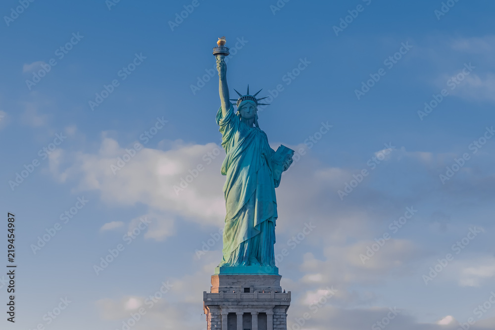 Fototapeta premium Statue of Liberty in New York City from the frontal view with the base