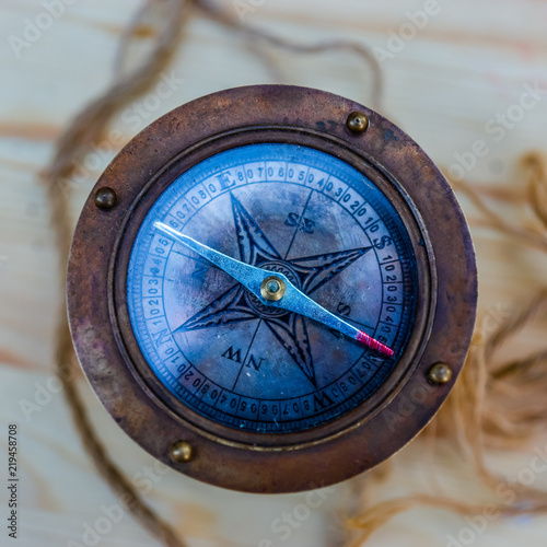 Ancient nautical compass viewed from above