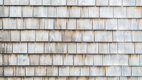background texture close up of weathered wooden shingles on a vintage colonial building in Massachusetts