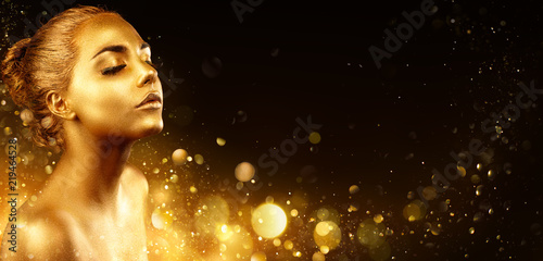 Golden Makeup - Fashion Model Portrait With Gold Skin And Glittering In Shiny Background
