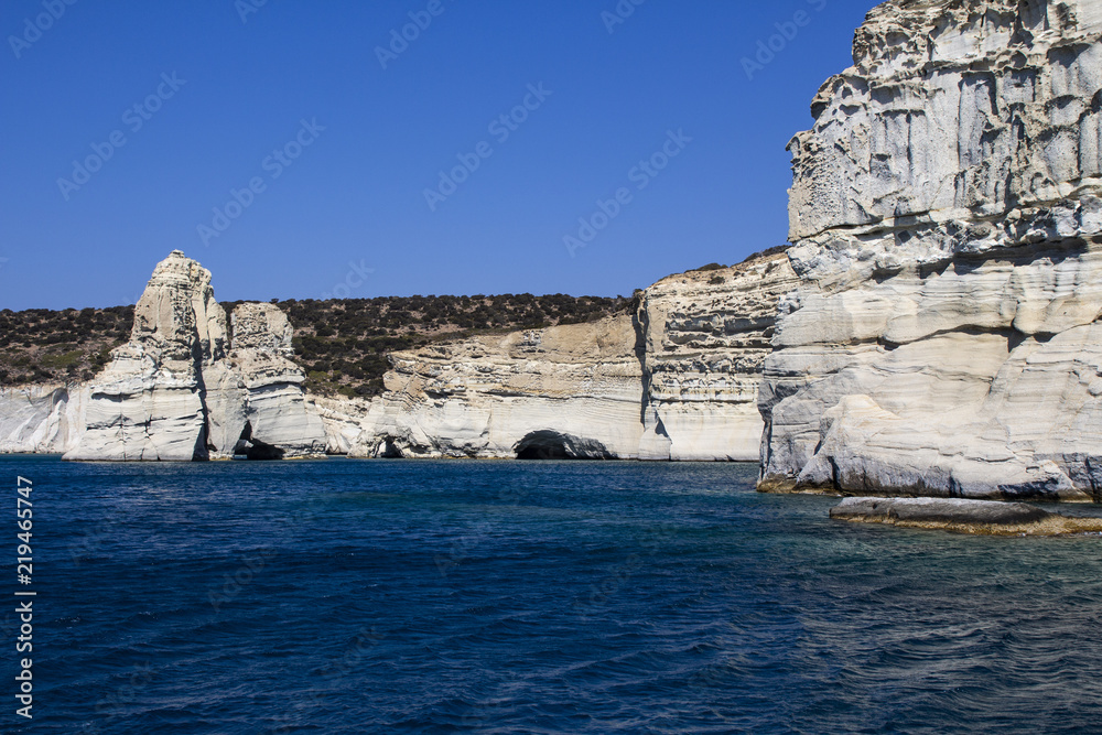 Rock formations and sea caves at Kleftiko shoreline in Milos, Greece