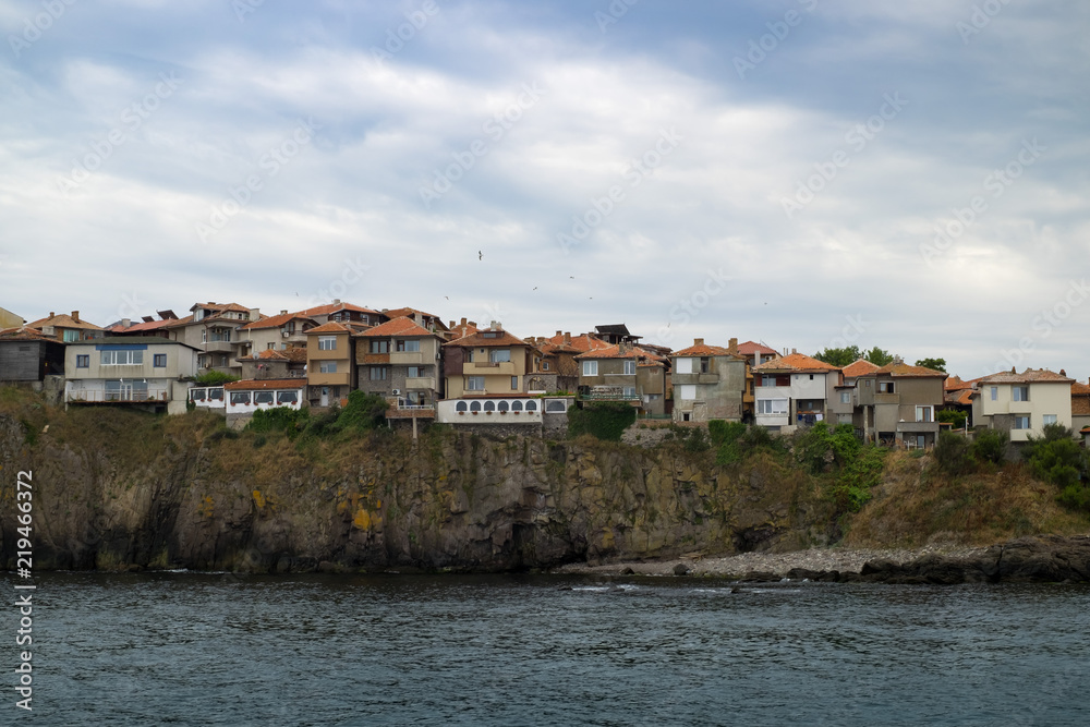 The town of Sozopol is on a rocky beach overlooking the sea. Colorful houses of an ancient city in Bulgaria.