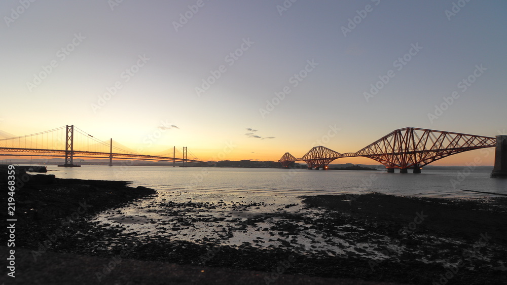 Sunset in South Queensferry, Scotland, overlooking the Forth Rail Bridge and the Forth Road Bridge Sunset in South Queensferry, Scotland, overlooking the Forth Rail Bridge and the Forth Road Bridge