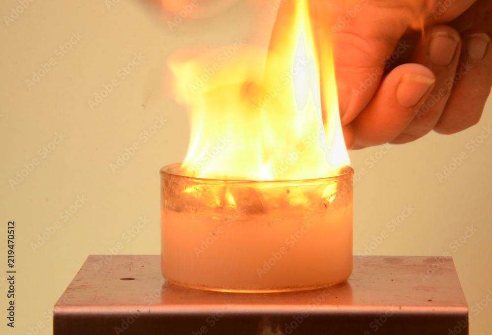 Calcium Carbide dissolves in water, creating Acetylene gas. This rather