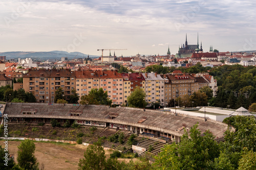 An old brownfield of former football arena contra renovated buildings in Brno, Czech Republic. Sadness of famous arena, where lots of mathes were played but modernisation brings that arena to oblivion