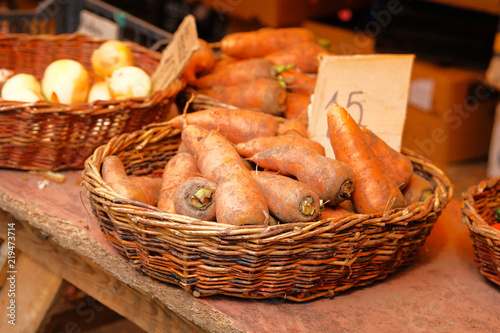 Photos Carrots are sold at local vegetable farming market