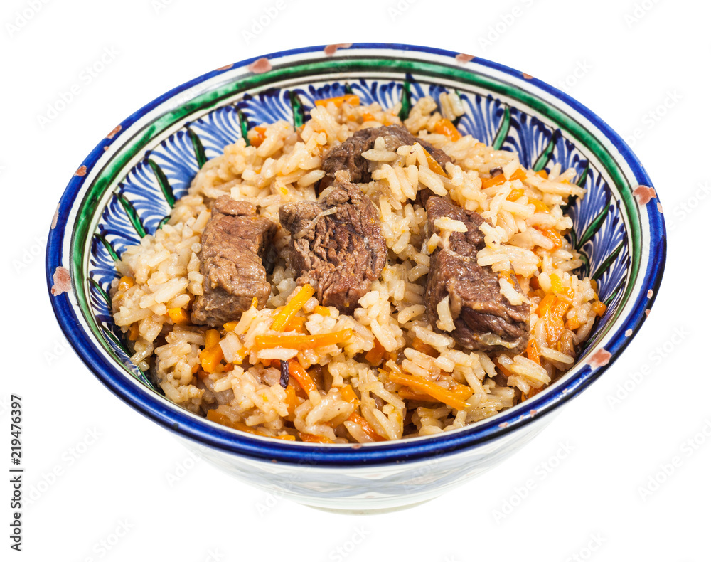 above view of plov in traditional ceramic bowl above view of plov in traditional ceramic bowl