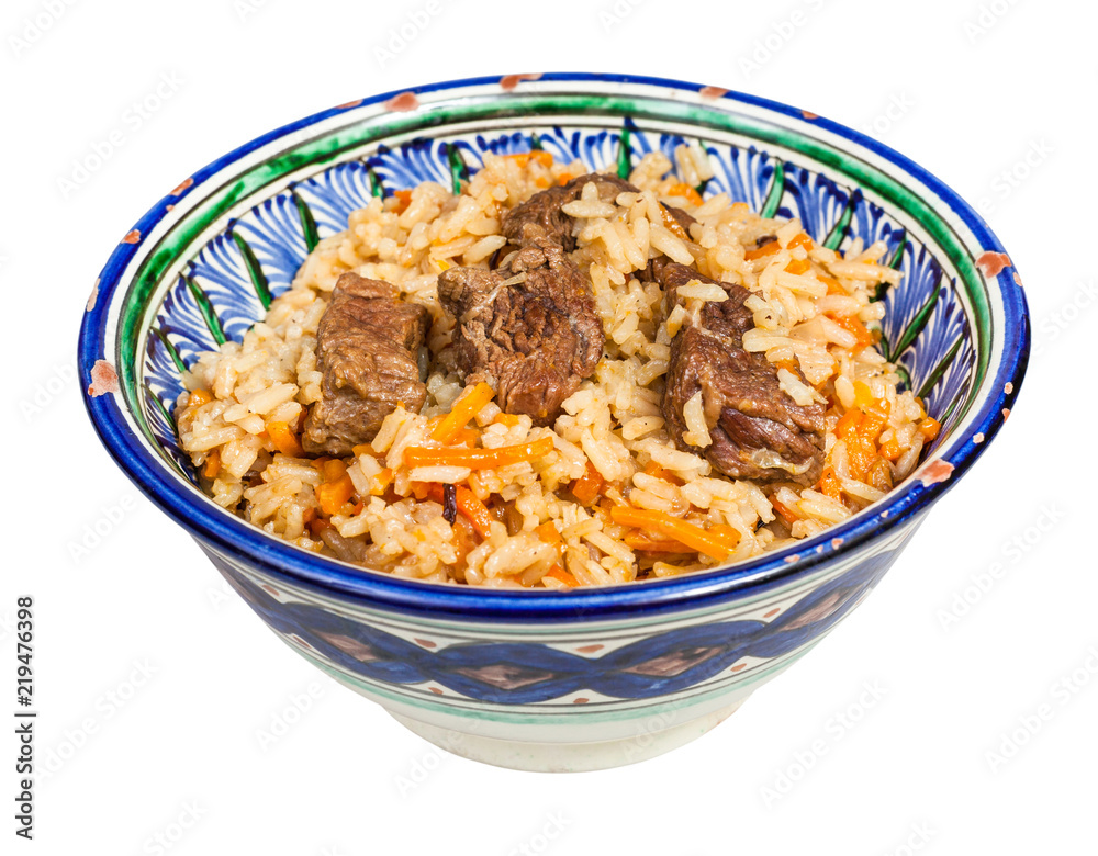 above view of pilau in traditional ceramic bowl