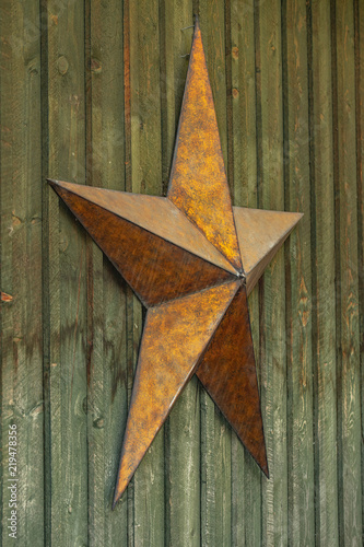 country rusty metal star on barn 
