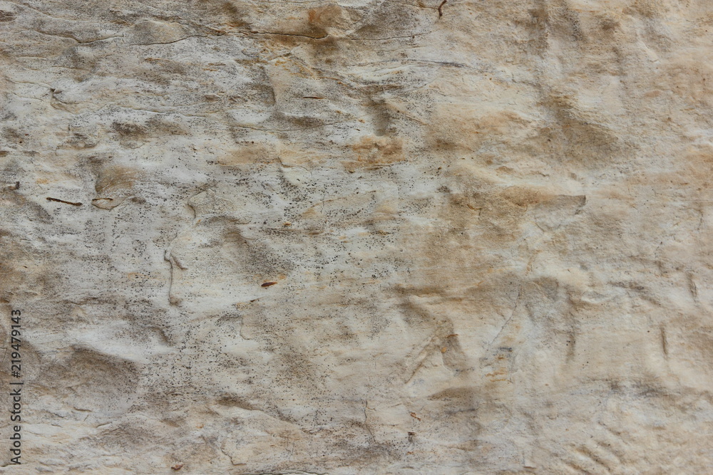 Texture of an old wall. Surface of an ancient temple in Prague. Background of stone for the designer. Pattern in brown tones Texture of an old wall. Surface of an ancient temple in Prague. Background of stone for the designer. Pattern in brown tones