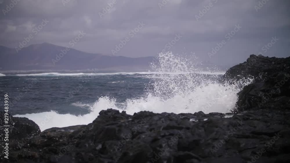 Slow motion waves on coast, wide Slow motion waves on coast, wide