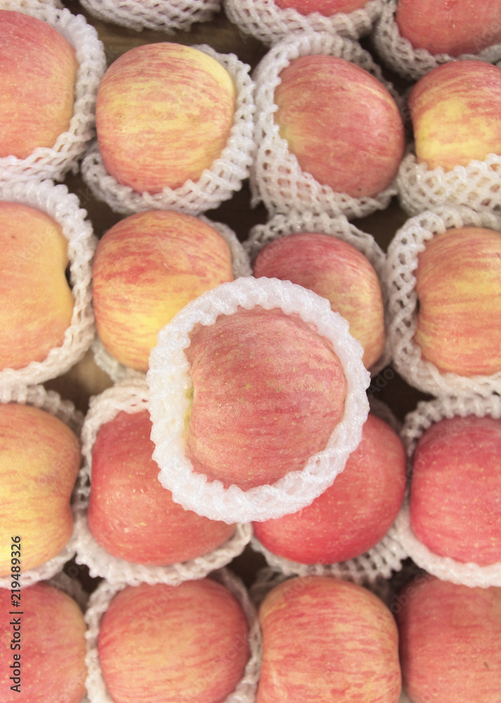 Fruit basket filled with apples in the fruit market Fruit basket filled with apples in the fruit market