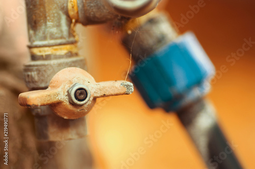 Old water valve and pipe retro color