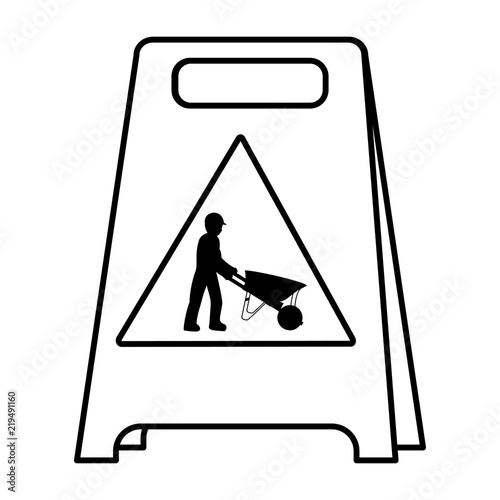 line plastic caution emblem and laborer with wheelbarrow