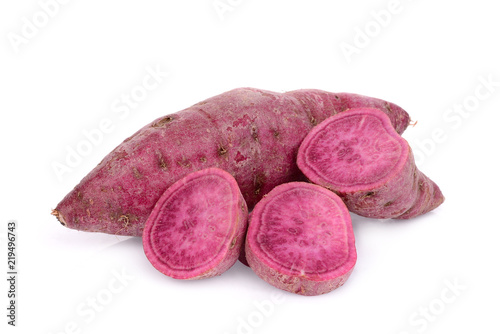 raw sweet potatoes isolated on white background