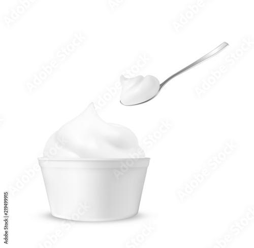 Ice cream in a cup with a spoon