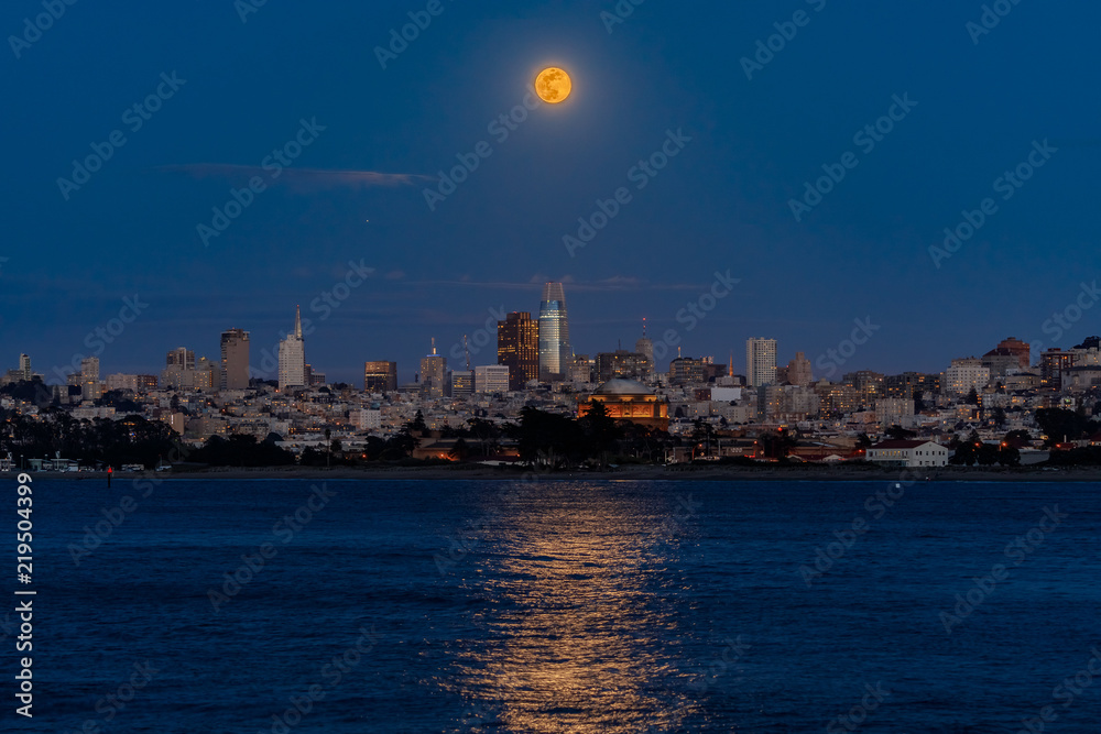 Panorama of moonrise above San Francisco Downtown viewed from Marina District