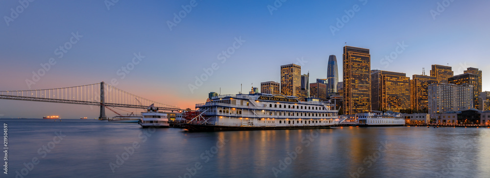 San Francisco Belle and downtown at Christmas from wooden Pier 7 at sunset.