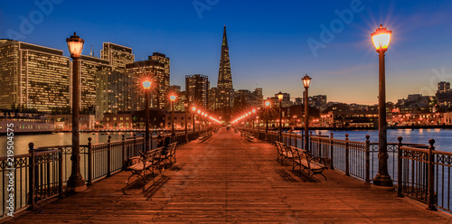 Downtown San Francisco and the Transamerica Pyramid at Christmas from wooden Pier 7 at sunset photo