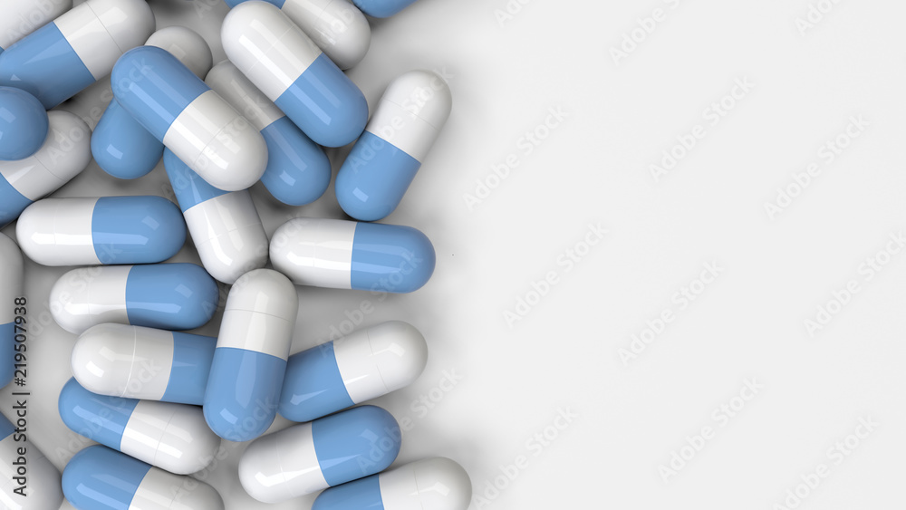 Pile of white and blue medicine capsules Pile of white and blue medicine capsules
