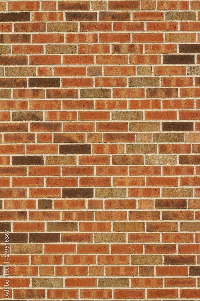 Fototapeta premium Vintage brown multi-tone brick wall background with Flemish stretcher bond brickwork pattern