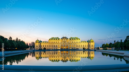 Belvedere Palace with reflection at night in Vienna city, Austria. photo