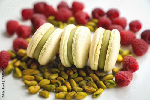 french macaron and pistachio on white background photo