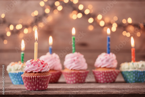 cupcakes on dark old wooden background