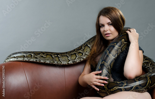 sexy big tits girl and big python in the studio 