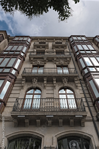 beautiful traditional facades of historic building in bilbao, spain
