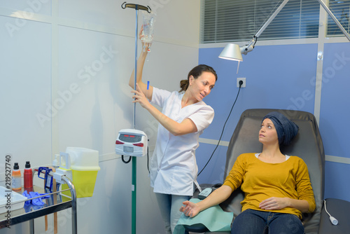 Photos Young lady being connected up for chemotherapy