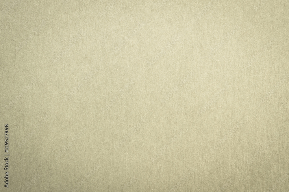 Recycled craft paper textured background in mixed yellow green brown split color Recycled craft paper textured background in mixed yellow green brown split color