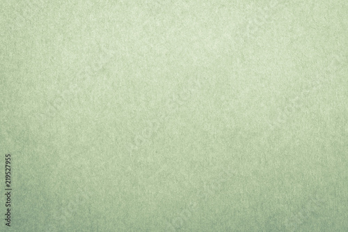 Recycled paper texture background in green lime color tone.