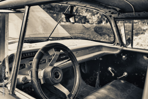 black and white tone of old american car interior in havana
