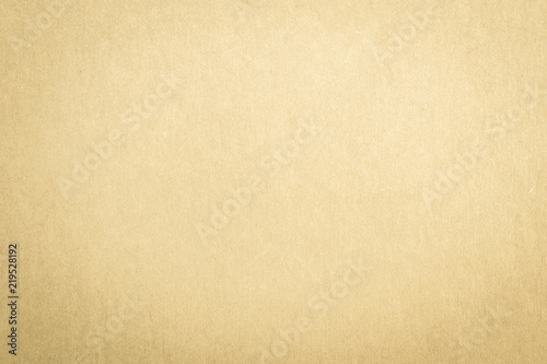 Recycled paper texture background in yellow cream color tone