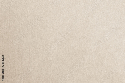 Recycled paper texture background in cream color.